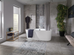Antique Acero tile on bathroom floor with freestanding tub
